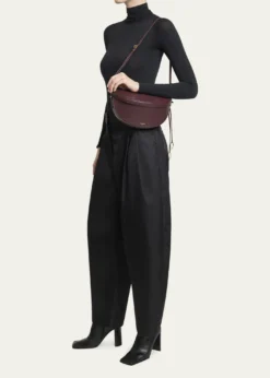 ALAIAEast-West Curved Goatskin Leather Shoulder Bag