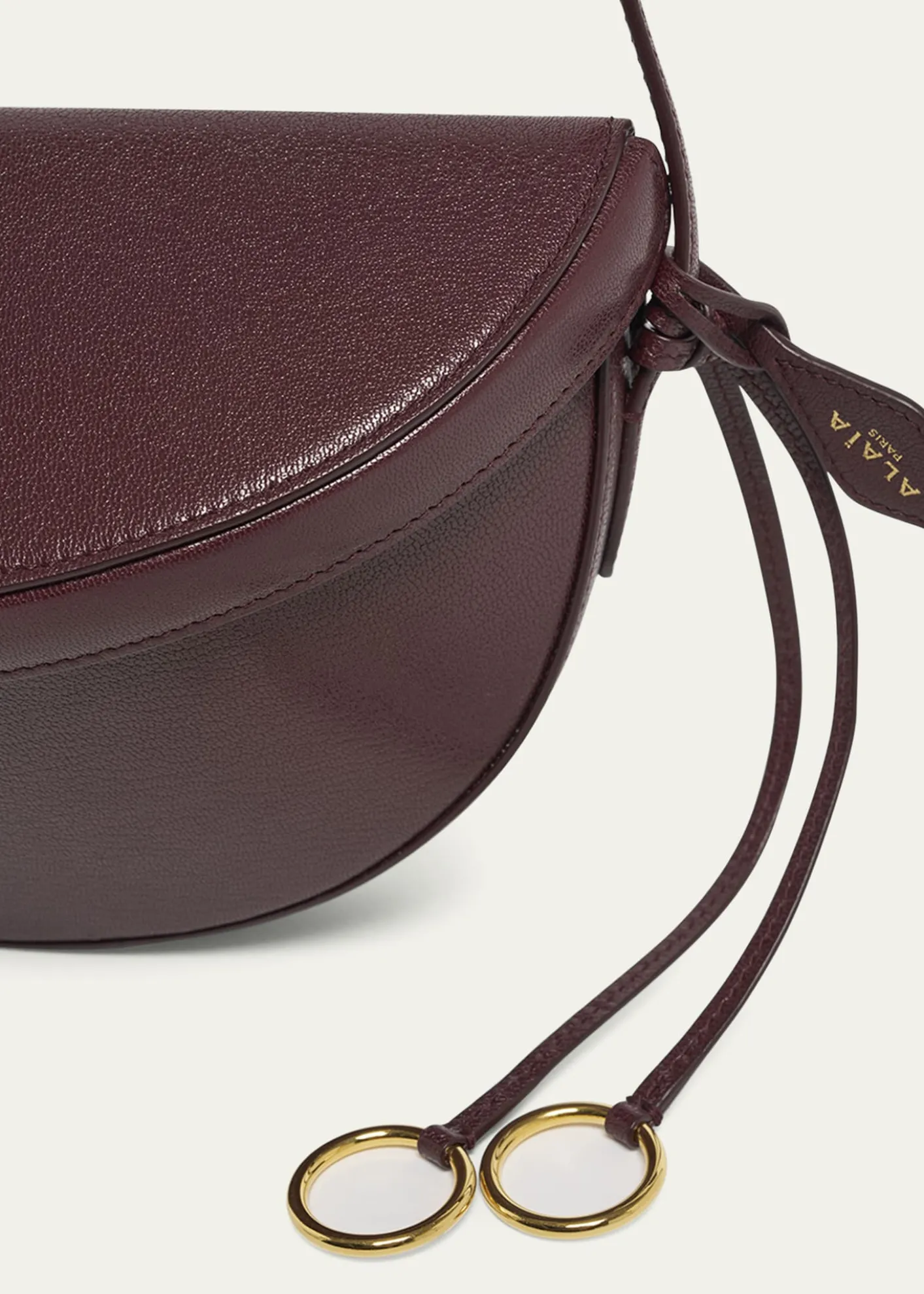ALAIAEast-West Curved Goatskin Leather Shoulder Bag