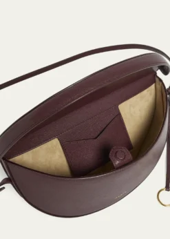 ALAIAEast-West Curved Goatskin Leather Shoulder Bag
