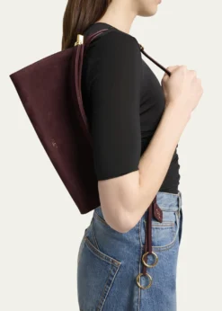 ALAIALe Click Medium Shoulder Bag in Suede