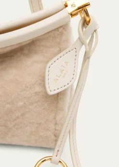 ALAIALe Click Shaved Shearling Small East-West Shoulder Bag