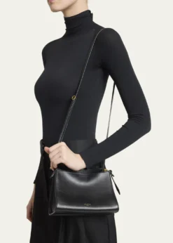 ALAIALe Click Small Square Shoulder Bag in Glossy Leather