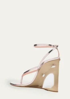 ALAIAMirrored Leather Invisible Wedge Thong Sandals