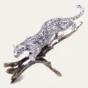 Jay StrongwaterSnow Leopard Descending Branch Tabletop Object
