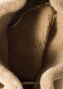 Miu MiuAventure Belted Shearling Shoulder Bag