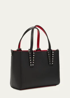 THIS ITEM IS NOT AVAILABLE.Christian LouboutinCabata Mini Tote Bag in Leather with Spikes
