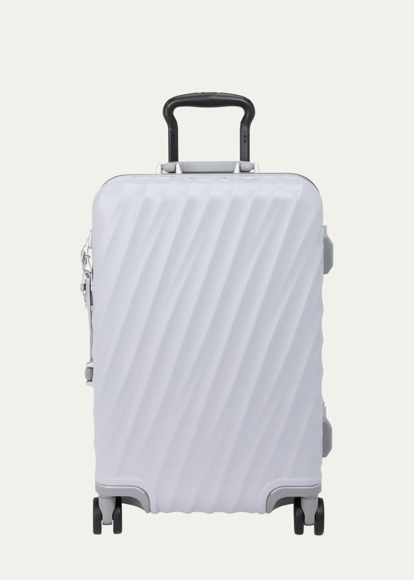 TUMIInternational 4-Wheel Hard Carry-On Spinner