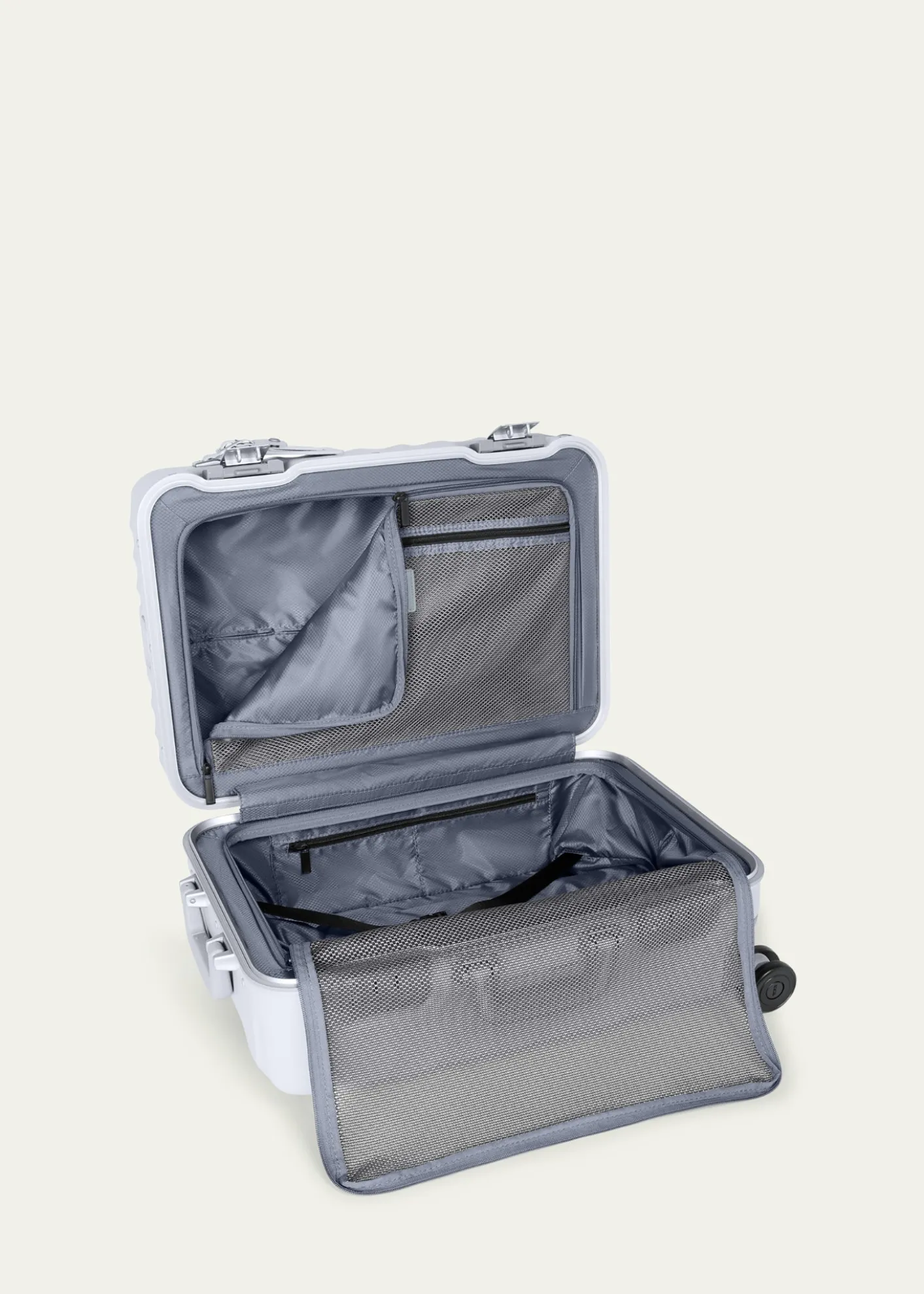 TUMIInternational 4-Wheel Hard Carry-On Spinner