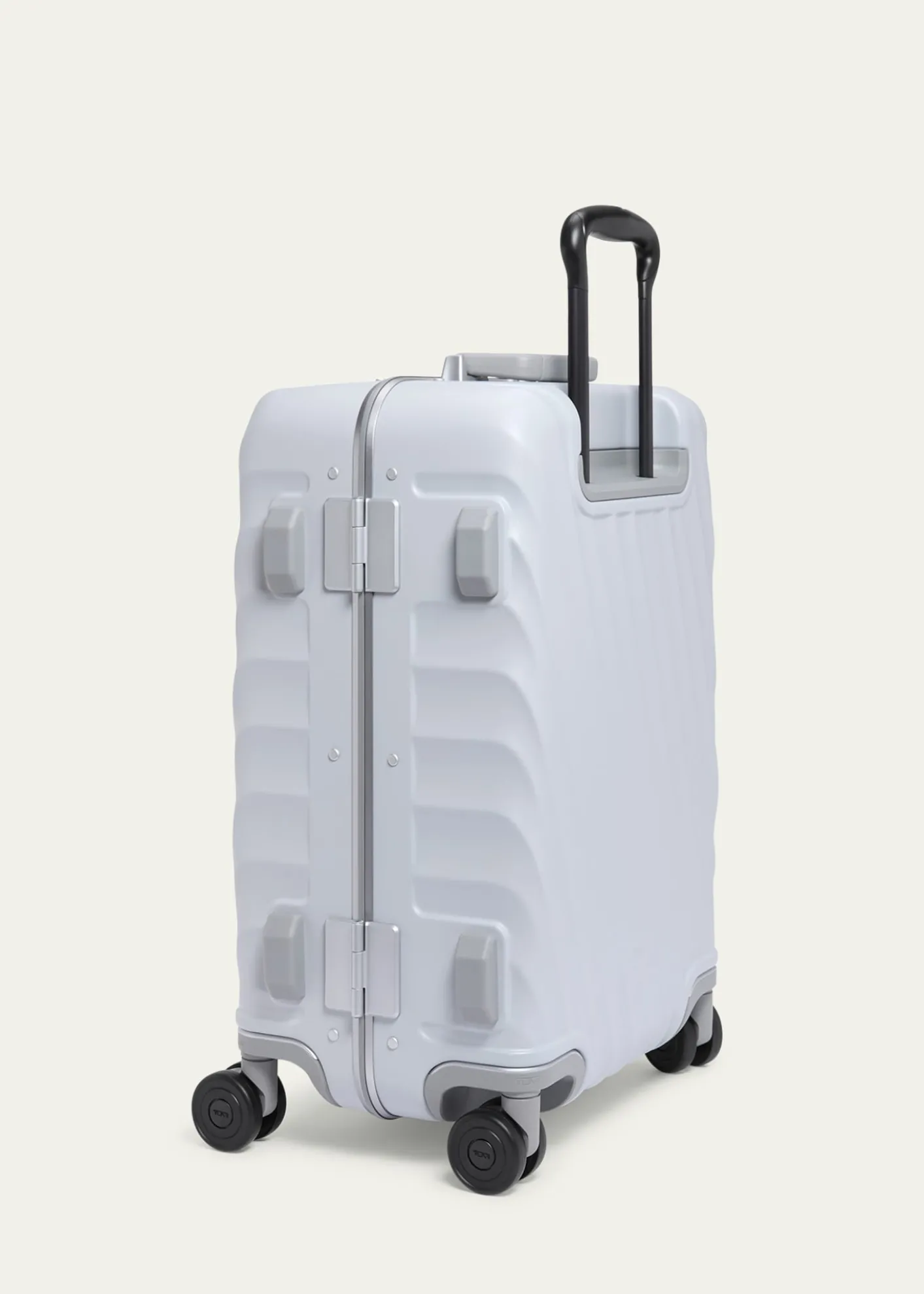 TUMIInternational 4-Wheel Hard Carry-On Spinner